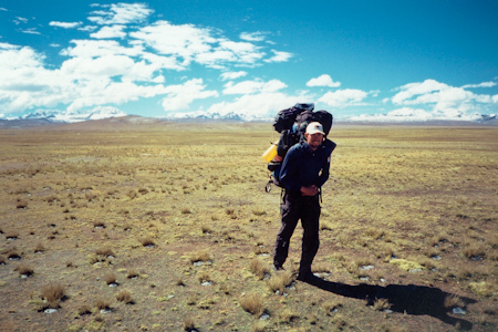 Michael Whlin on the long walk towards Peru. The Apolobamba mountains in the background.